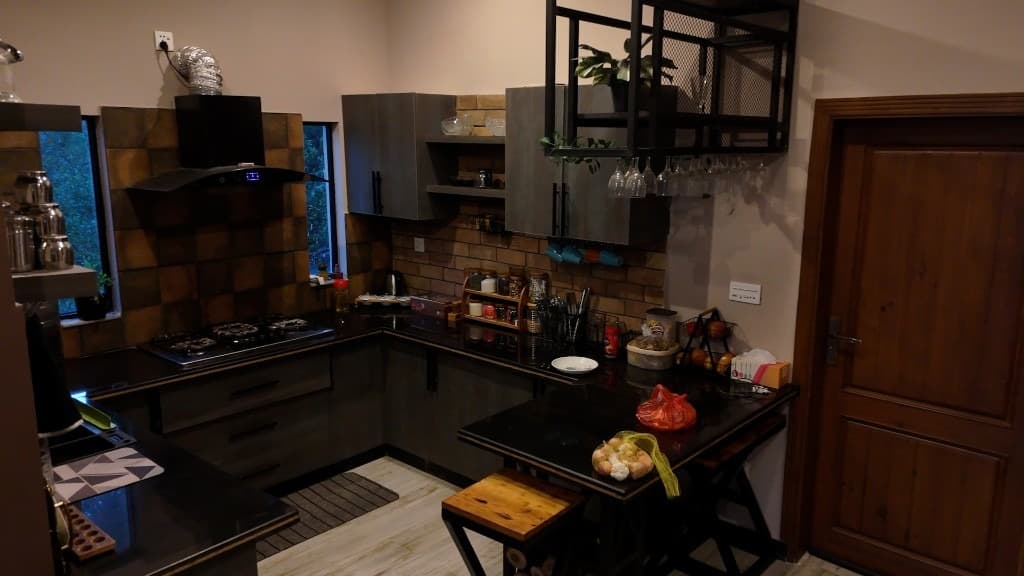 Fully equipped kitchen at ZeD Nest — OliveHill Cottages